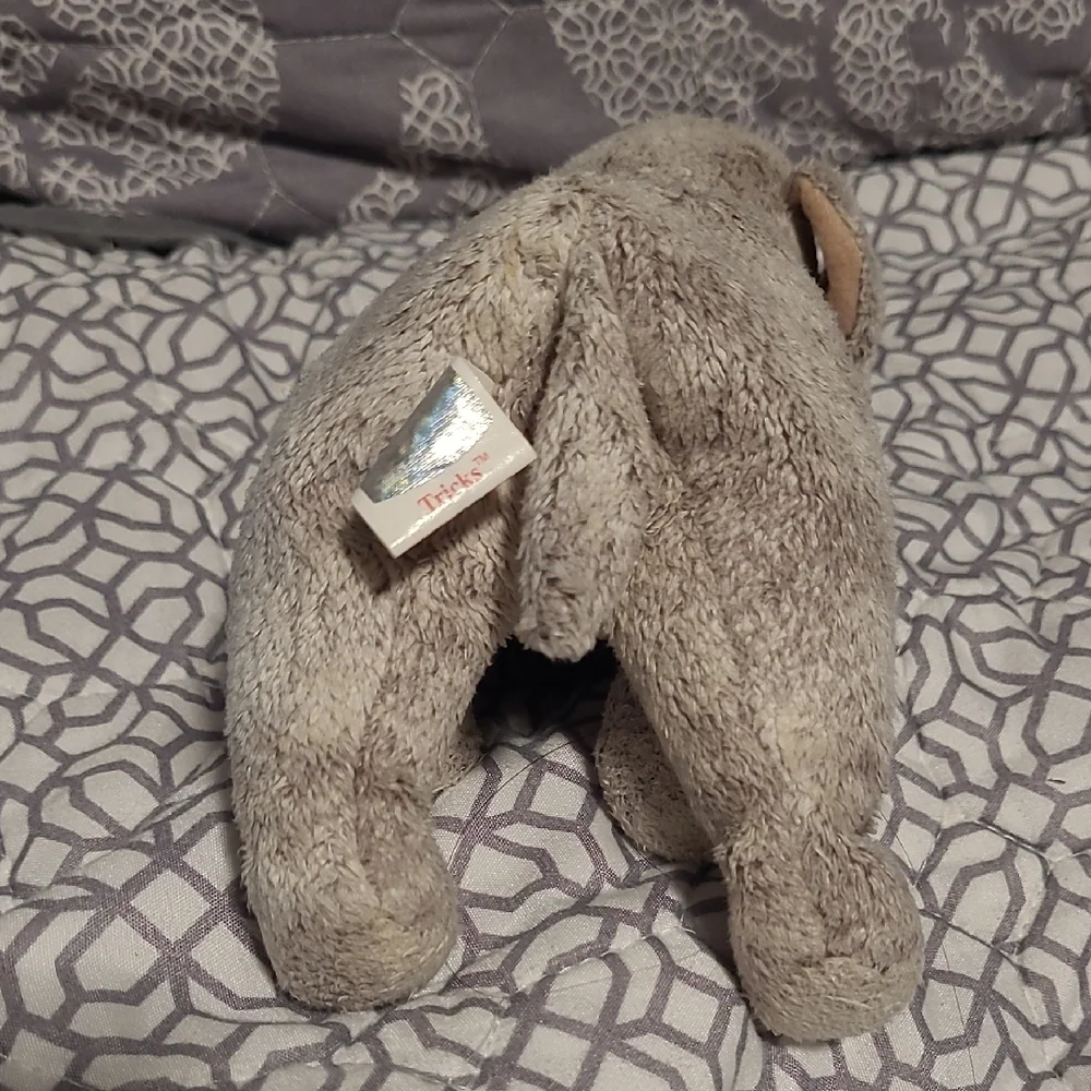 Plush Dog Toy with Red Bow